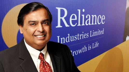 Mukesh Ambani_y el logotipo de Reliance Industries 